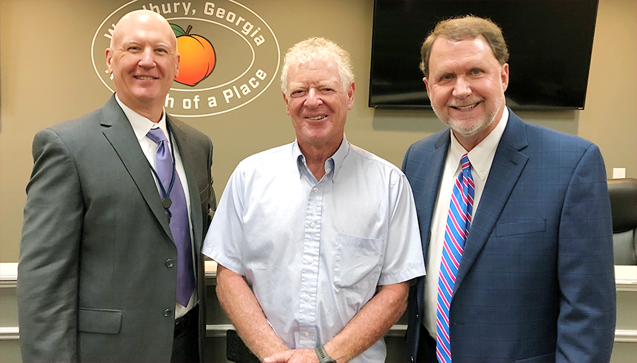 From left, Woodbury Mayor Steve Ledbetter, Concord Mayor John Strickland, and GMA Executive Director Larry Hanson.