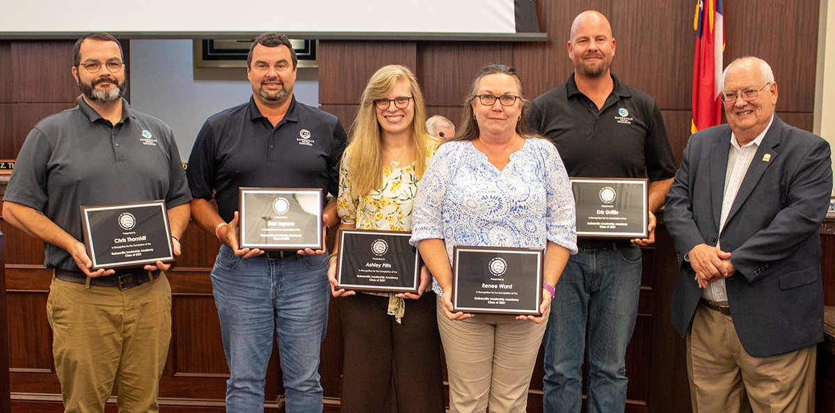 Gainesville Leadership Academy graduates from the city's Department of Water Resources with Mayor Danny Dunagan.