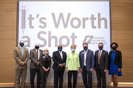 Dr. Kathleen Toomey joins city leaders during GMA's press conference. 