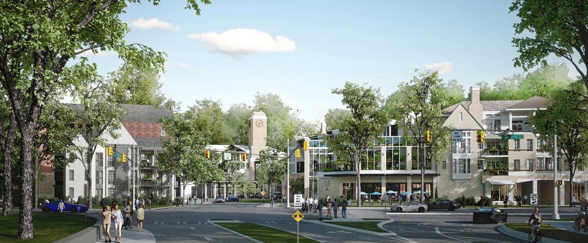 The entrance, with assisted living building on left, Center for Vibrant Living (with tower), and mixed-use building on right. Source: Shook Kelly.