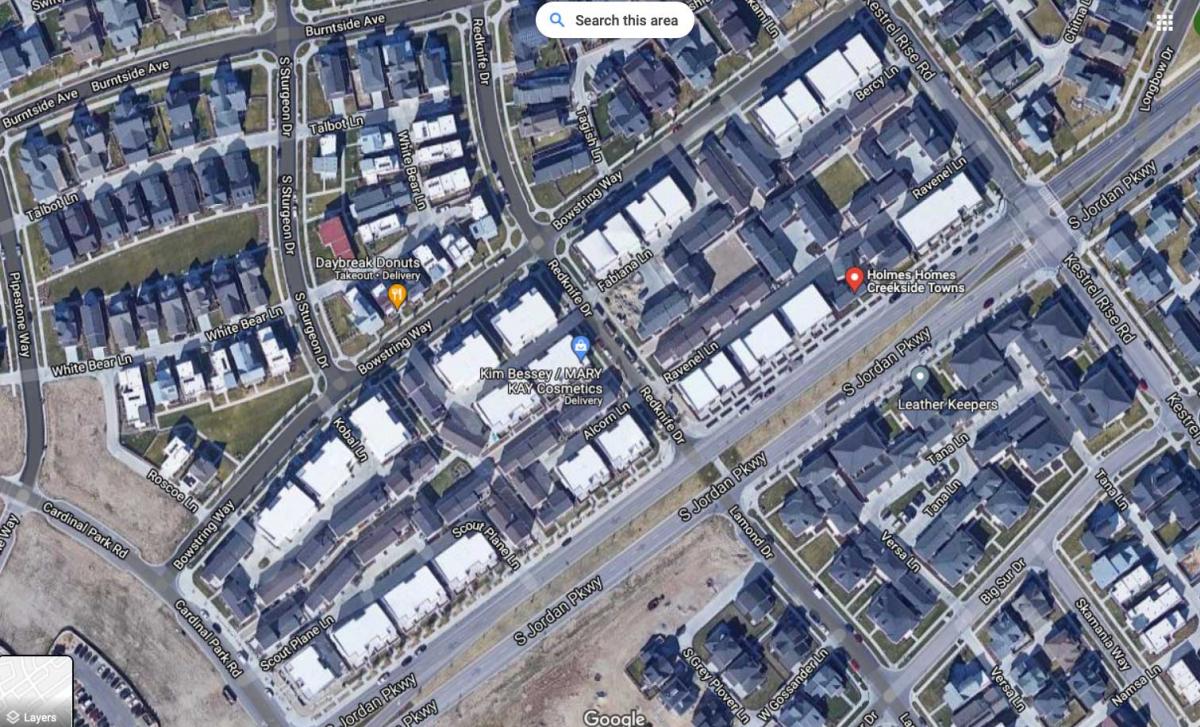 The Daybreak Mews development on Google. The Mews homes are on the interior of the two central blocks.