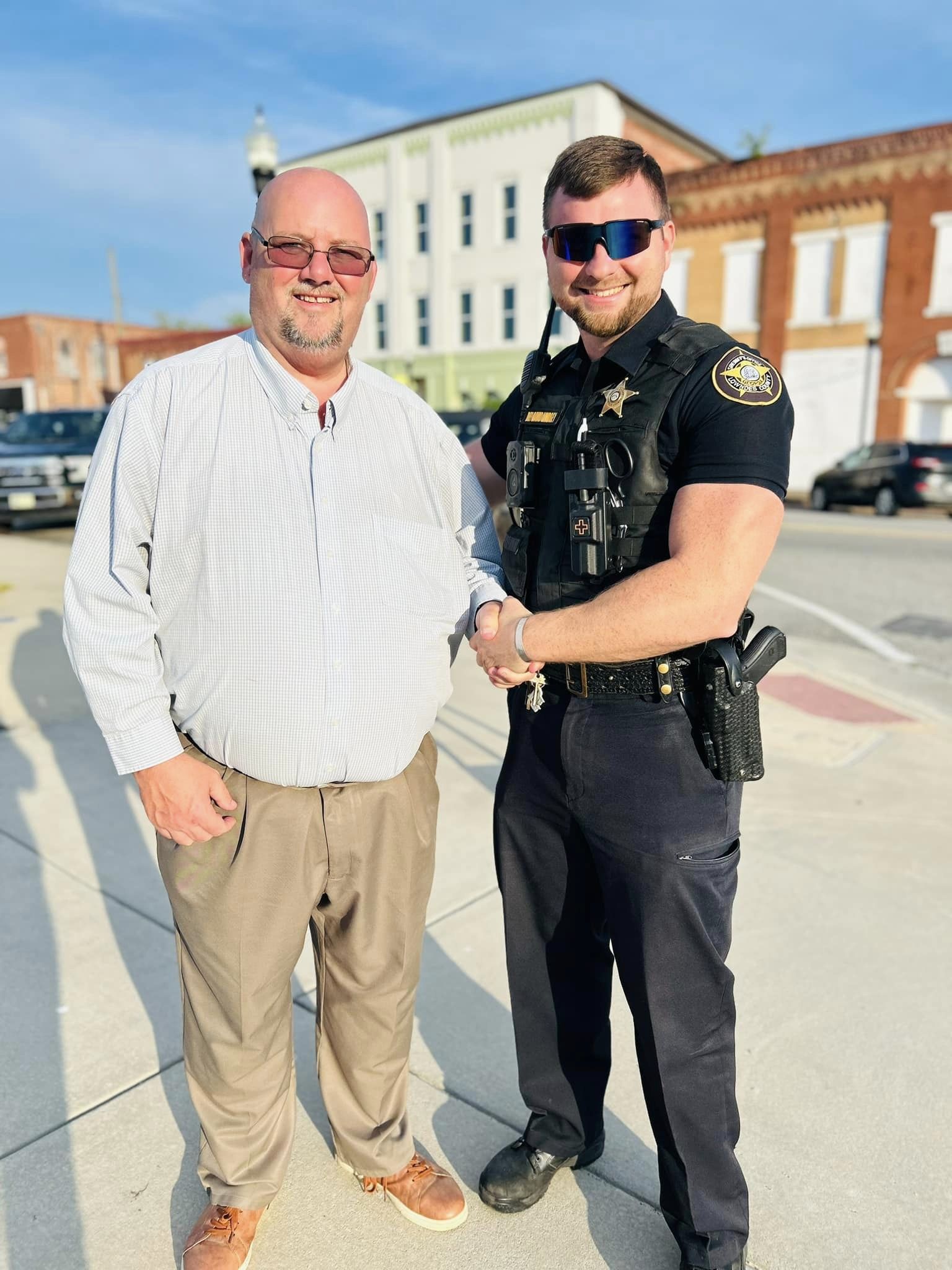 City policeman with resident 