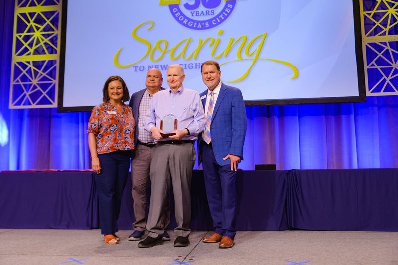 Photo of Michael Brown receiving his award.